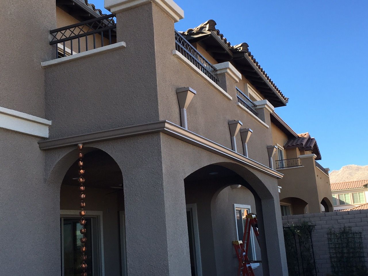 Two-story Mediterranean with S-tile roof